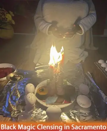 In the gentle glow of candlelight, a serene ritual unfolds, enveloping the space in warmth and tranquility. The arrangement speaks of sacred intentions and deep connections, inviting peace and clarity into the heart. Black magic cleansing in Sacramento.