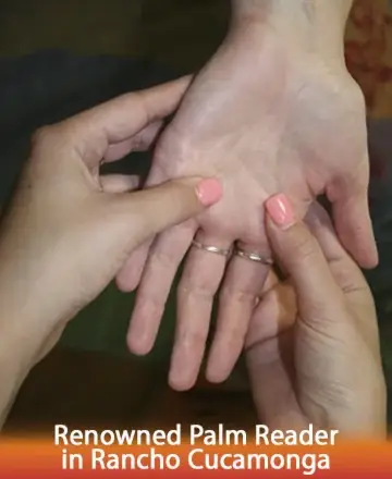 In a serene moment of connection, gentle hands cradle a palm, promising insight and clarity. The warmth of human touch speaks of guidance and understanding, offering a path to inner peace and wisdom. Palm reading in Rancho Cucamonga.