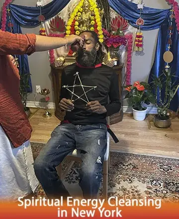 In a serene sanctuary adorned with vibrant flowers and calming hues, a gentle ritual unfolds, enveloping the spirit in warmth and renewal. The tranquil setting invites a deep sense of peace and inner clarity. Spiritual energy cleansing in New York.
