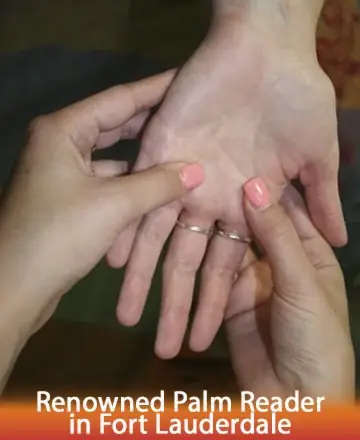 In a serene setting, gentle hands cradle a palm, offering insight and comfort. This moment of connection invites a sense of peace and understanding, guiding you toward clarity and inner calm. Palm reading in Fort Lauderdale.
