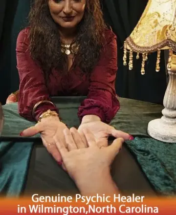 In a serene and inviting space, a gentle guide extends warmth and understanding through a heartfelt connection. The soft glow of a lamp casts a comforting light, inviting peace and clarity. Discover harmony and wisdom with a genuine psychic healer in Wilmington, North Carolina.