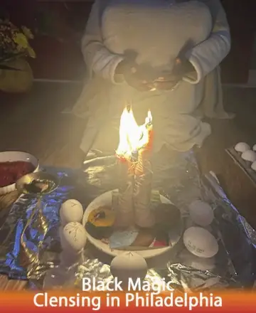 In a serene setting, gentle flames flicker, casting a warm glow that invites peace and introspection. Surrounded by symbols of purity and transformation, the atmosphere is rich with possibility and renewal. Trust in this sacred space for guidance and clarity. Black magic cleansing in Philadelphia.