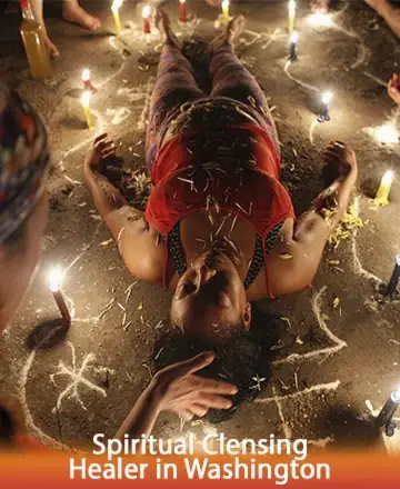 In a serene circle of gentle light, a soul rests peacefully surrounded by flickering candles and soothing symbols. The atmosphere is rich with healing energy, offering a sanctuary of calm and renewal. Experience the journey of spiritual cleansing in Washington.