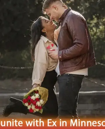A couple embraces outdoors, the woman holding a bouquet of red and white roses. She's wearing a beige jacket, he's in a brown leather jacket. Sunlight filters through trees, creating a warm ambiance.