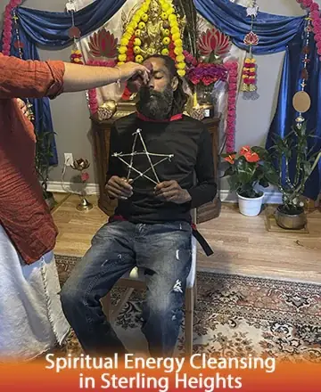 In a serene space adorned with vibrant flowers and peaceful symbols, a gentle ritual unfolds, bringing a sense of calm and renewal. The atmosphere is filled with warmth and compassion, inviting transformation and healing. Spiritual energy cleansing in Sterling Heights.