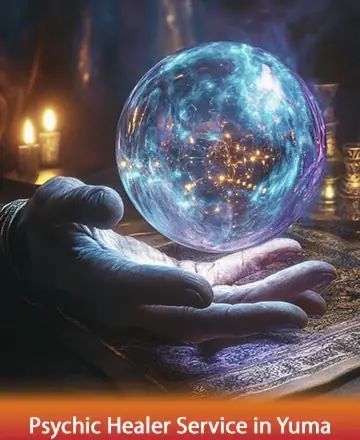 In the gentle glow of candlelight, a hand cradles a shimmering crystal ball, swirling with cosmic wonders. This calming scene invites reflection and serenity, offering a sanctuary for the soul. Embrace the warmth of inner peace and spiritual guidance. Psychic healer service in Yuma.
