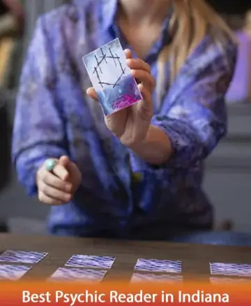 In a serene and inviting atmosphere, a gentle hand gracefully presents a beautifully illustrated card, inviting you into a world of insight and tranquility. The experience promises understanding and comfort, offering a pathway to inner peace. Tarot reading in Indiana.
