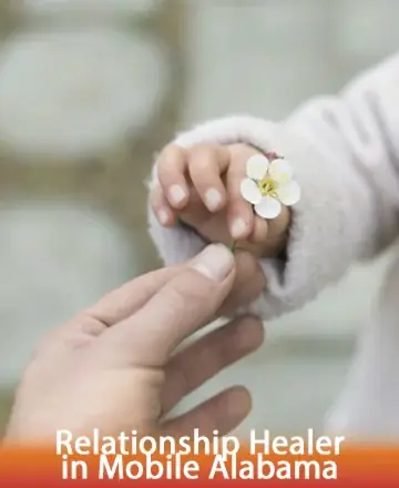 In the gentle touch of a child's hand offering a delicate blossom, we find a moment of pure connection and love. This image invites us to embrace vulnerability and openness, fostering healing and understanding. Relationship healer in Mobile Alabama.