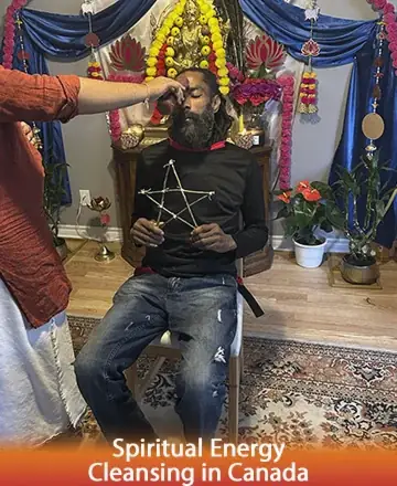 In a serene sanctuary adorned with vibrant colors and sacred symbols, a gentle ritual unfolds, offering profound peace and renewal. The atmosphere is filled with a deep sense of trust and spiritual wisdom, guiding one towards inner harmony. Spiritual energy cleansing in Canada.