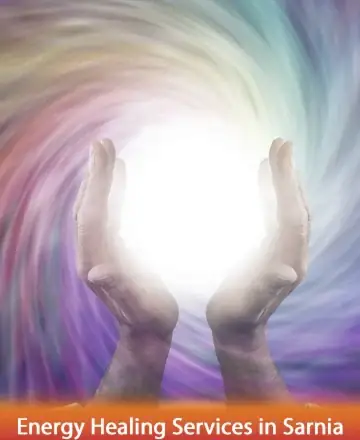 In the gentle embrace of vibrant colors, two hands cradle a radiant light, symbolizing the nurturing power of healing and spiritual connection. This serene image invites you to find tranquility and balance within your soul. Energy healing services in Sarnia.