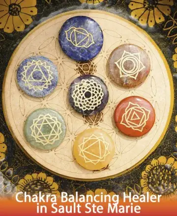 Discover the serene harmony of beautifully arranged chakra stones, each radiating gentle energy and profound wisdom. This calming imagery invites you to embrace inner peace and balance, guided by the universe's loving embrace. Chakra balancing healer in Sault Ste Marie.