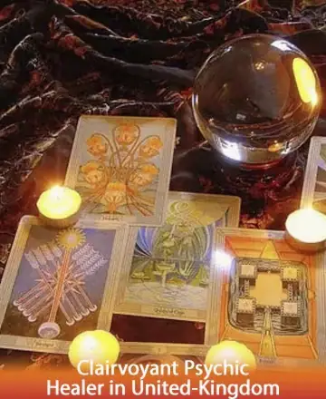 In this serene setting, softly glowing candles illuminate beautiful tarot cards, inviting a sense of calm and introspection. A crystal ball glistens gently, radiating wisdom and clarity. This harmonious scene fosters deep connection and understanding. Psychic guidance in the United Kingdom.