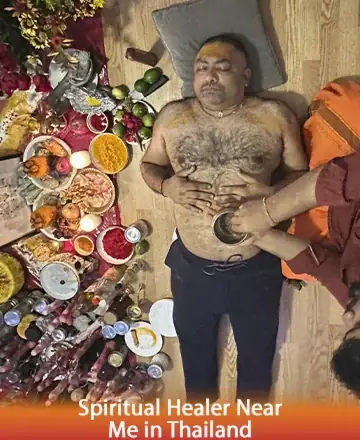 In a serene setting, a gentle hand rests upon a peaceful soul, surrounded by vibrant offerings that reflect life's abundant beauty. The atmosphere is filled with tranquility and deep spiritual connection, inviting inner peace and holistic wellness. Spiritual healer near me in Thailand.