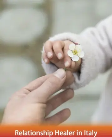In the gentle exchange of a delicate flower, two hands meet—one offering, one receiving—symbolizing the tender connections we nurture in our lives. This image captures the essence of trust, warmth, and the beauty of shared moments. Relationship healer in Italy.